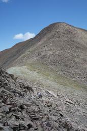 David and michelle head for the summit, passing another group, with barb and shasta in the foreground [fri jul 6 12:22:56 mdt 2018]